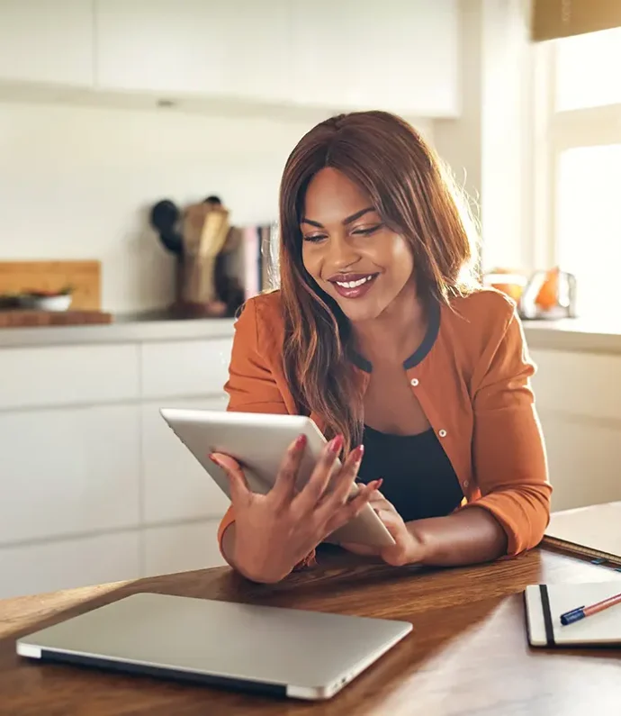 Female-Entrepreneur-Using-a-Tablet-in-Her-Kitchen